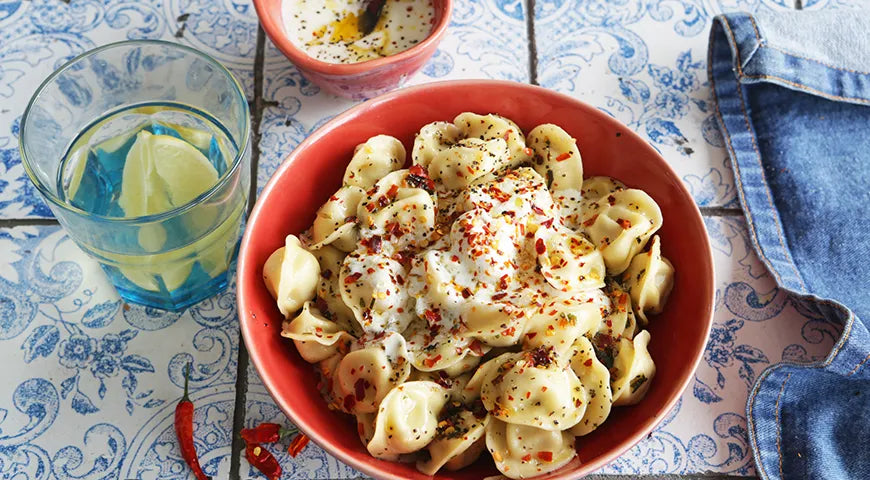 Pelmeni with Spicy Oil Dressing and Yogurt Sauce - wilfosbrand.com