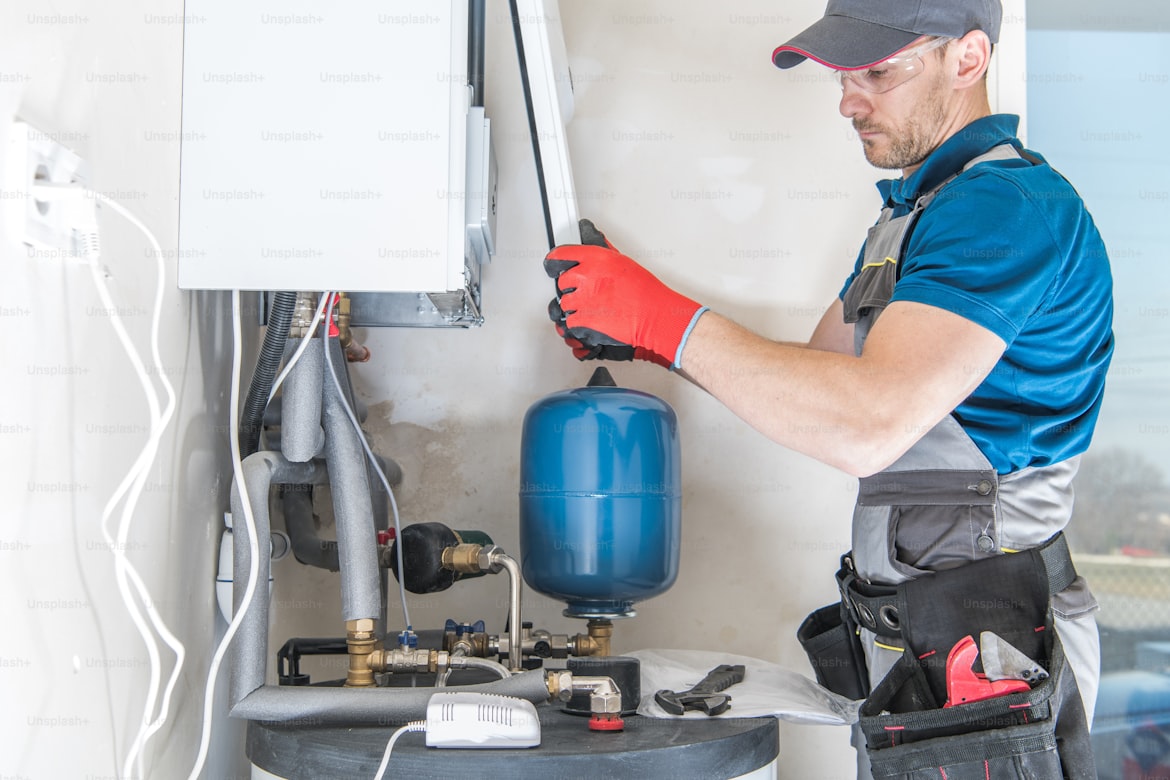 Male plumber at work